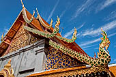 Chiang Mai - Wat Phra That Doi Suthep. Detail of the roof finials of one of the two largest vihan of the temple. 